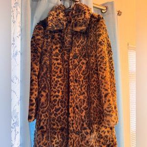 Jcrew leapord coat in excellent condition. Worn only couple of times. Very warm